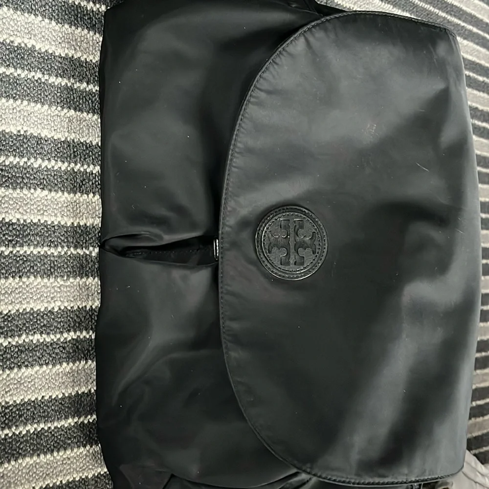 Tory Burch diaper bag. Gently used.  black.  Includes changing pad.